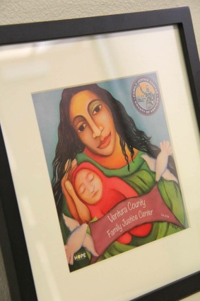 Alliance for HOPE International artwork - Painting of a woman holding a baby 