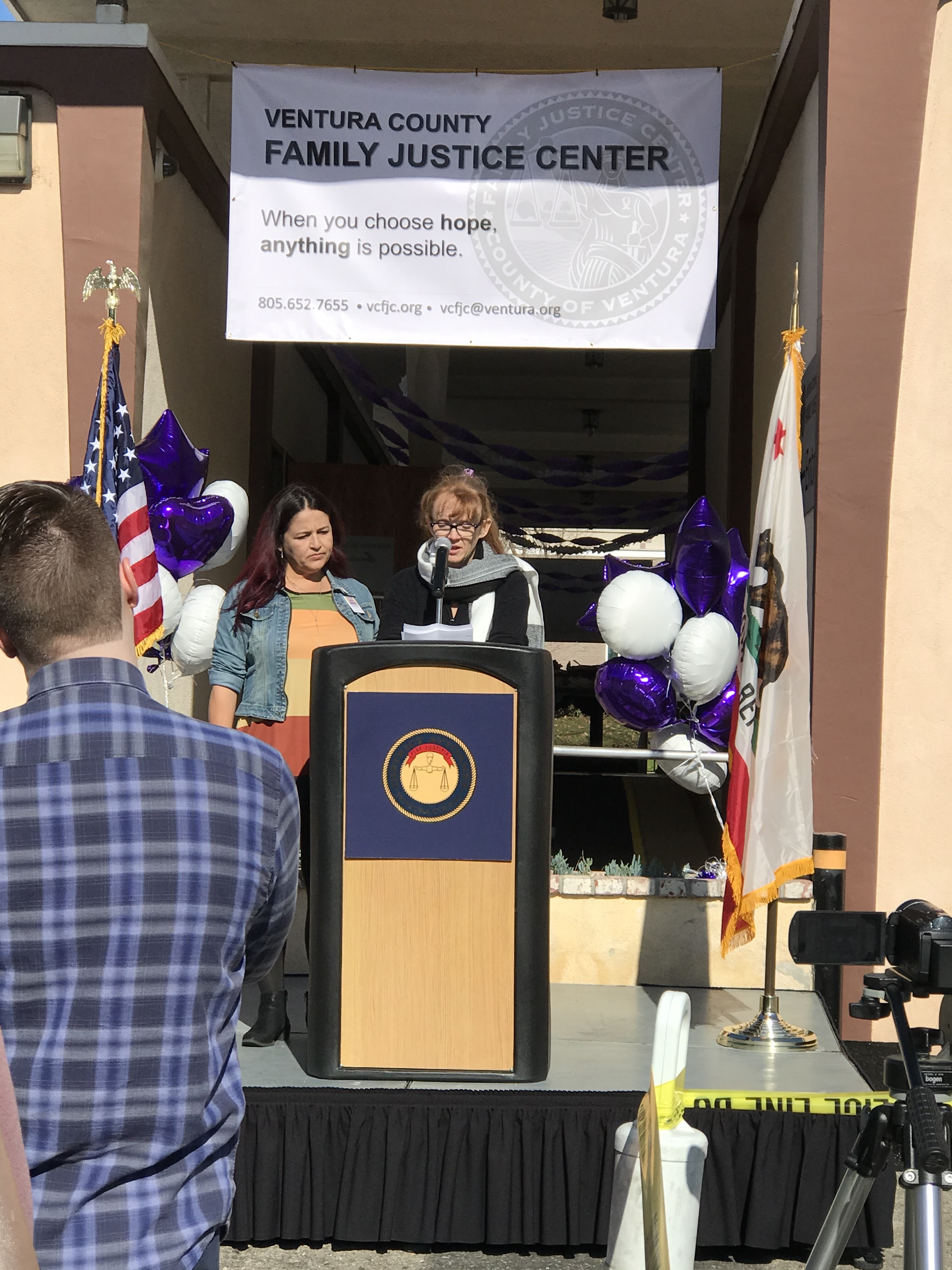 Woman speaks to crowd at the Ventura County Family Justice Center Grand Opening
